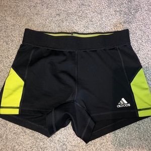 Gray and green compression shorts